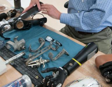 Multiple prosthetic devices on work bench